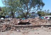 आनंद कॉलोनी रोड से लगी भूमि से अतिक्रमण हटाया गया